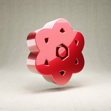 Atom simgesi. Beyaz beton arkaplanda izole edilmiş kırmızı parlak metalik atom sembolü.