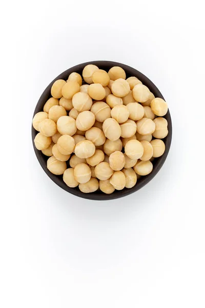 Noci Macadamia Pulite Ciotola Rotonda Sfondo Bianco Vista Dall Alto — Foto Stock