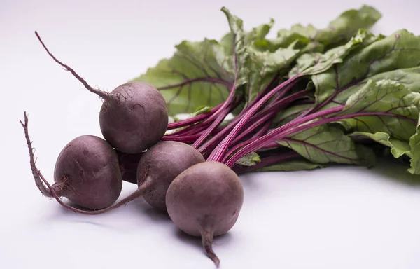 Freshly picked natural beet on a white background with copy space. Vegan concept.