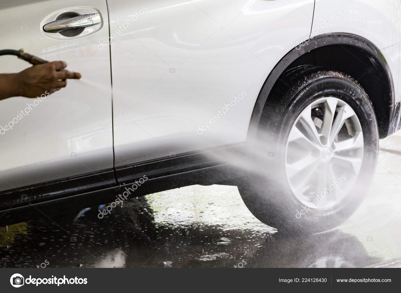 Worker Spraying Water Car Wash Garage Stock Photo C Thamkc
