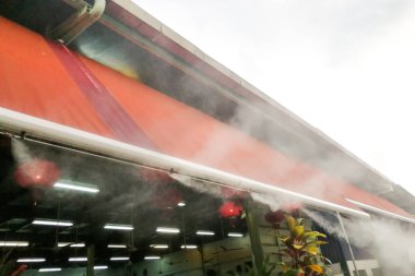 Soğutma sistemi su sis restoran sıcak tropikal iklim, ortam sıcaklığı düşürür