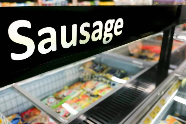 Sausage signage at the fresh refrigerated section of supermarket hypermarket