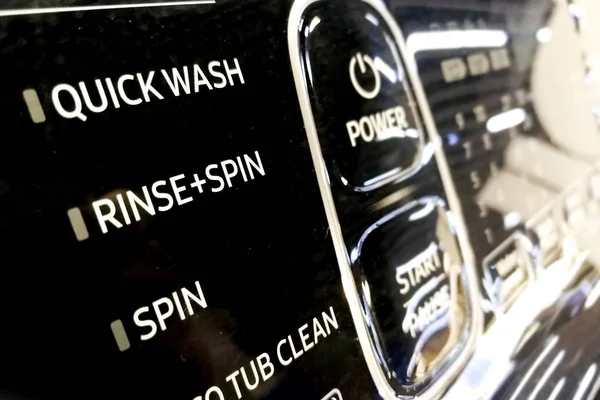 Focus on Quick Wash, Rinse, Spin of washing machine program control dial