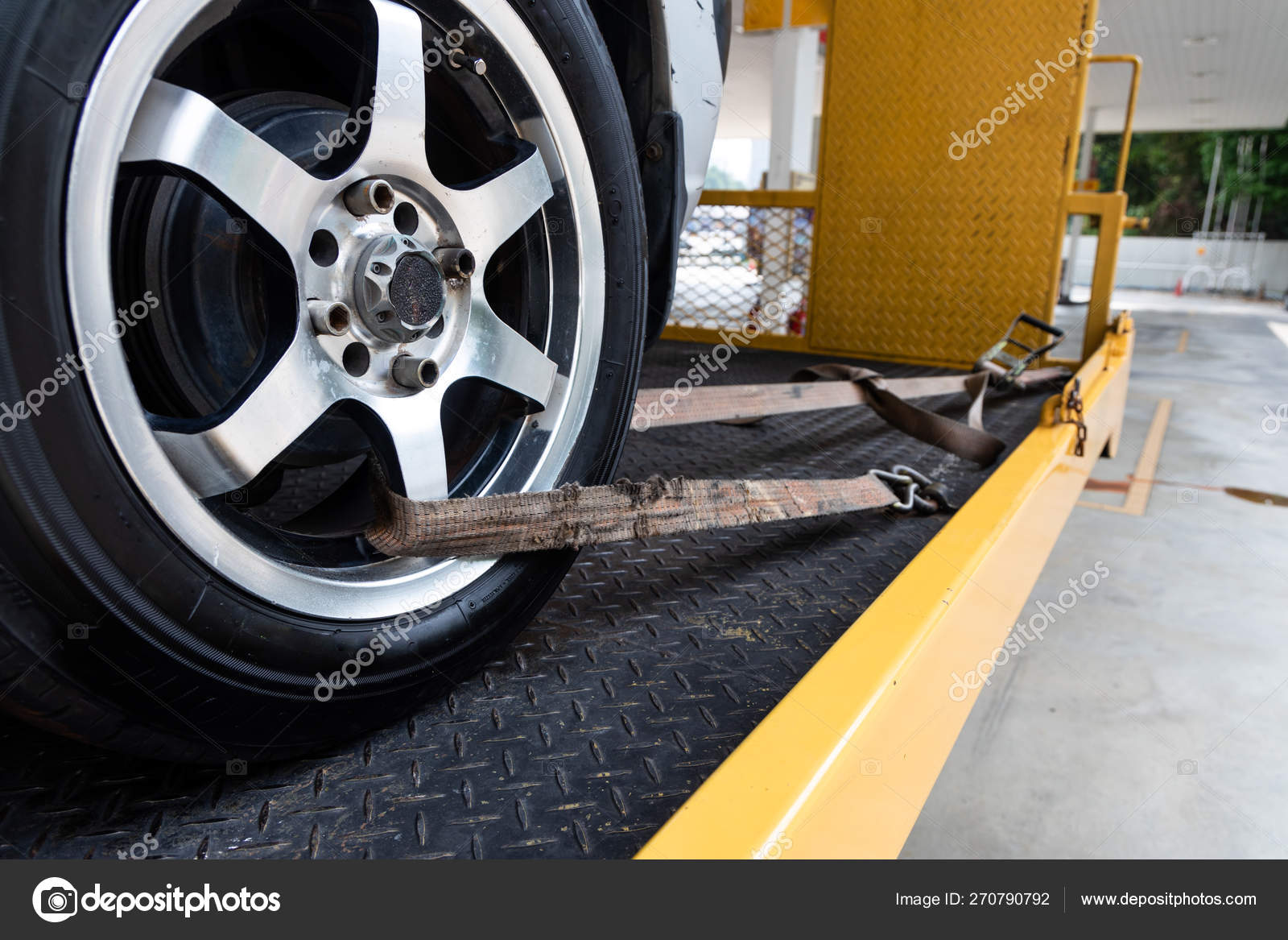 Car Tied With Security Strap On Flatbed Tow Truck Stock Photo