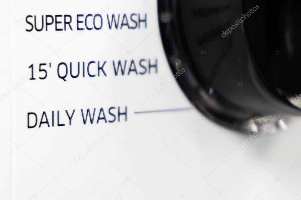 Closeup on Quick or Speed Wash  function on washing machine