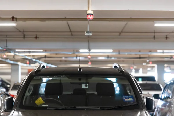 Smart car parking tracking system with lights signals vacancy availability