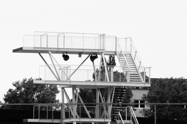 black and white picture of a diving platform