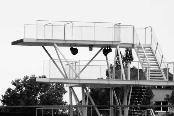 black and white picture of a diving platform
