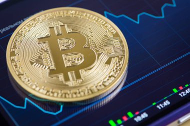 Para birimi grafik smartphone üzerinde karşı altın bitcoin