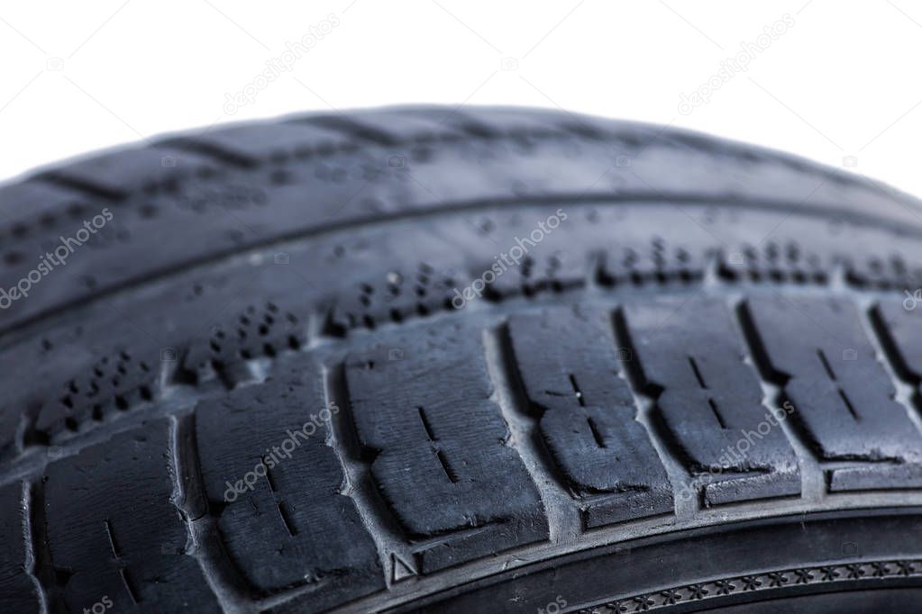 Old, used tyres isolated on white