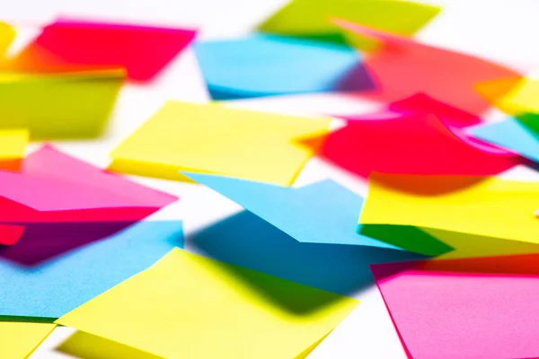 Many colorful sticky notes on white background