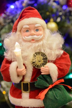  Noel Baba'nın elinde altın bitcoin