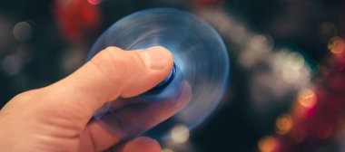  Elini arka plan üzerinde Spinner spin
