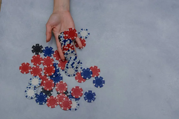 woman hands and playing chips