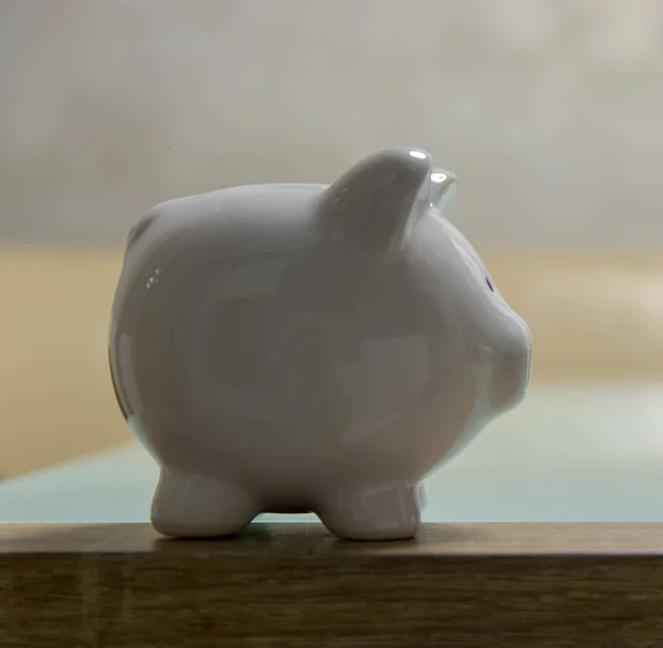 ceramic Piggy bank stand on table