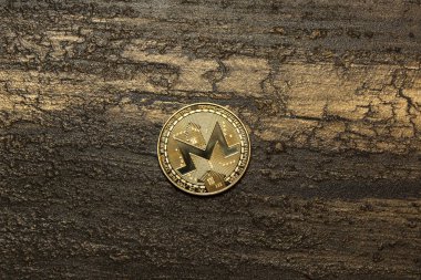  arka plan maded üzerinden dekoratif sıva üzerinde altın monero