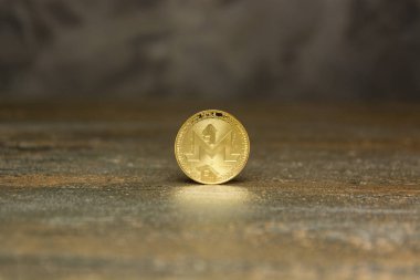 arka plan maded üzerinden dekoratif sıva üzerinde altın monero