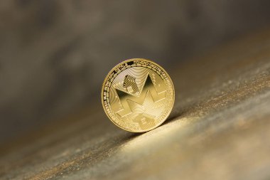  arka plan maded üzerinden dekoratif sıva üzerinde altın monero