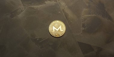  arka plan maded üzerinden dekoratif sıva üzerinde altın monero