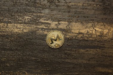  arka plan maded üzerinden dekoratif sıva üzerinde altın monero