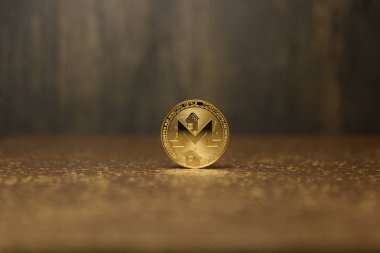  altın zemin üzerine altın monero
