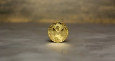  arka plan maded üzerinden dekoratif sıva üzerinde altın monero