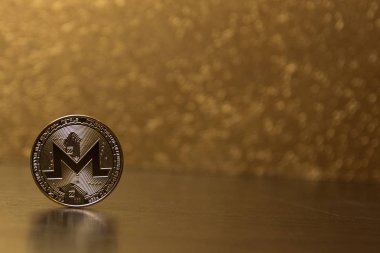  altın zemin üzerine altın monero