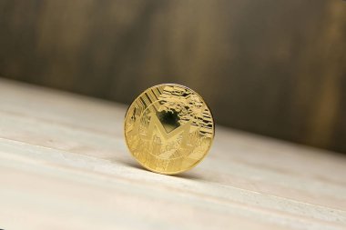  arka plan maded üzerinden dekoratif sıva üzerinde altın monero