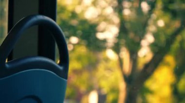 Bus journey through city interior medium zoom shot selective focus