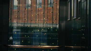 Lift elevator doors closing in shopping mall 4k shot selective focus