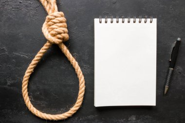 intihar ip döngü ve siyah bir arka plan üzerine bir Not