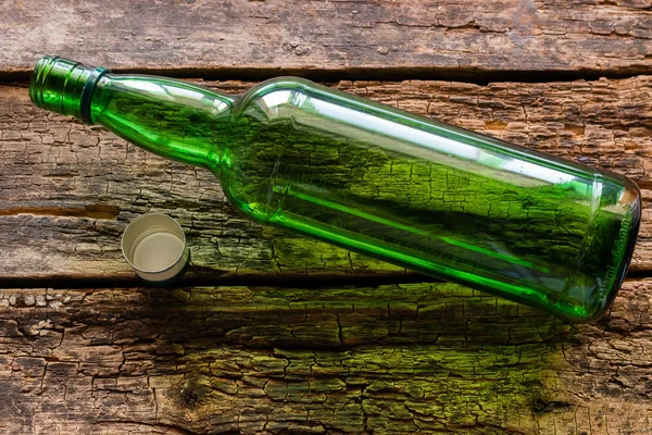 Botella Vacía Sobre Fondo Madera Alcoholismo —  Fotos de Stock