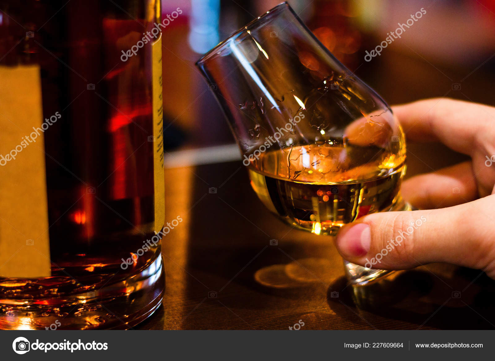 Download Man Tasting Single Malt Whiskey Glencairn Whiskey Glass Stock Photo Image By C Itakdalee 227609664