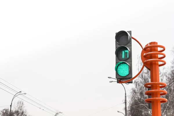 Pedestrian traffic light, go. Green with number 17.