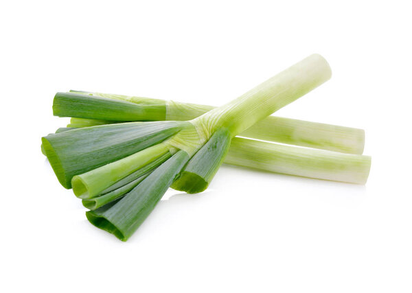 uncooked leek on white background