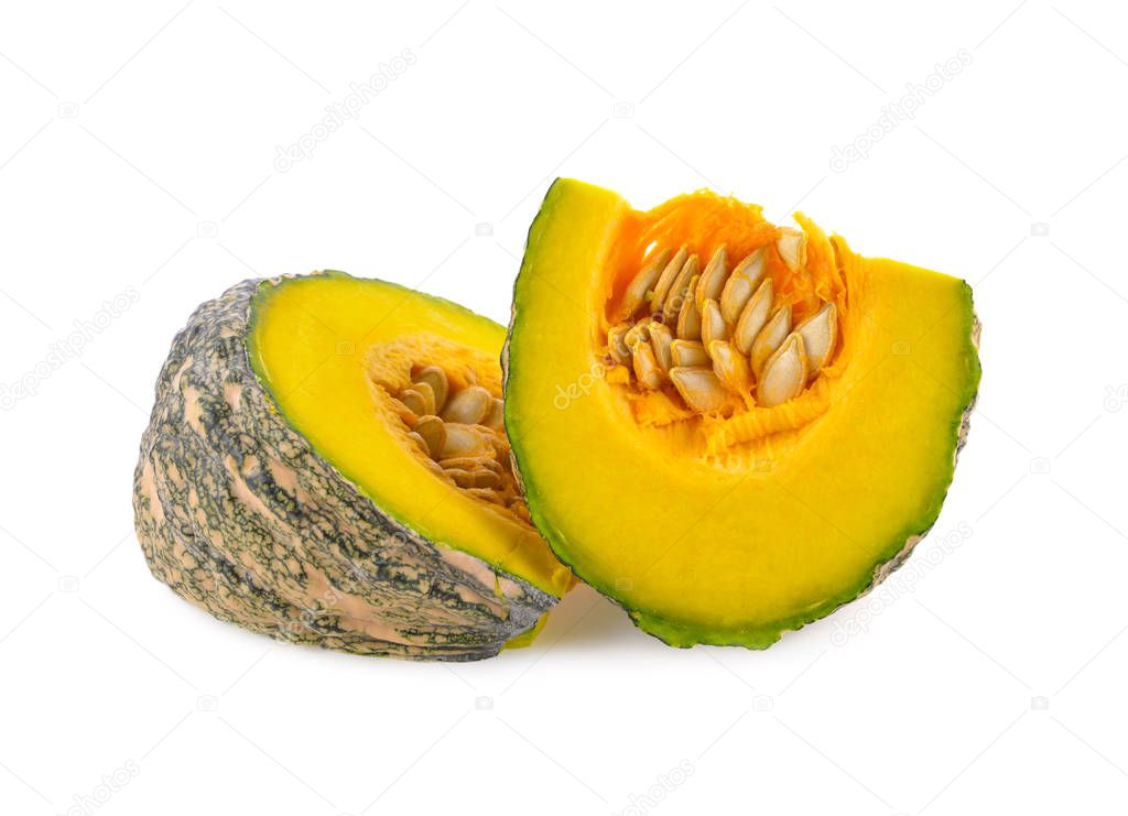 cut piece fresh pumpkin with shell and seeds on white background