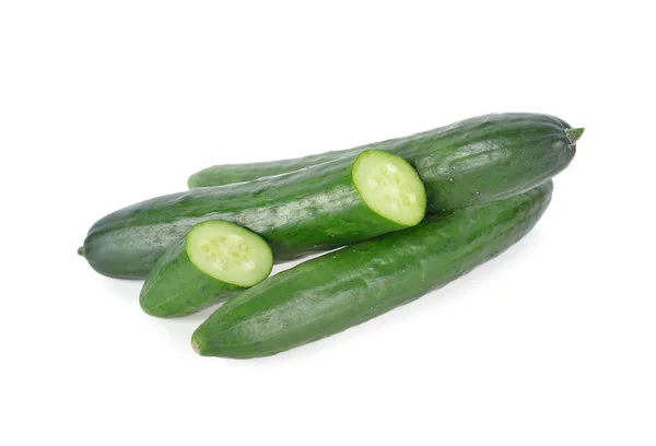 Whole and sliced fresh Japanese cucumbers on white background — Stock Photo, Image