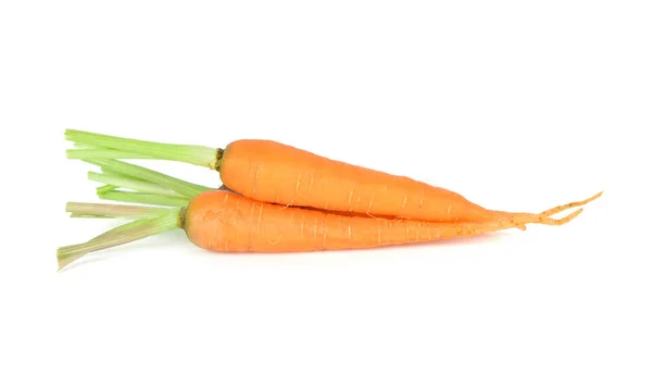 Ціла свіжа дитяча морква зі стеблом на білому тлі — стокове фото