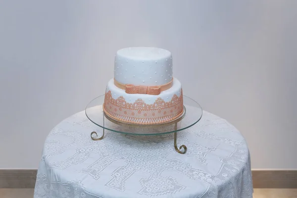 Elegant birthday cake with lace and orange color detail - Delicious White party cake on video table stand - Cute birthday cake on the table