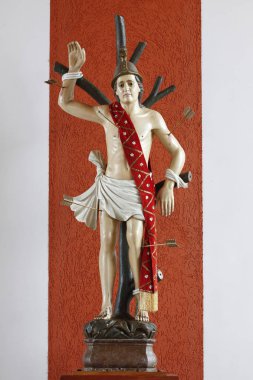 Saint Sebastian görüntüsünü müddətin heykeli bir okla - saint Katolik din vurdu