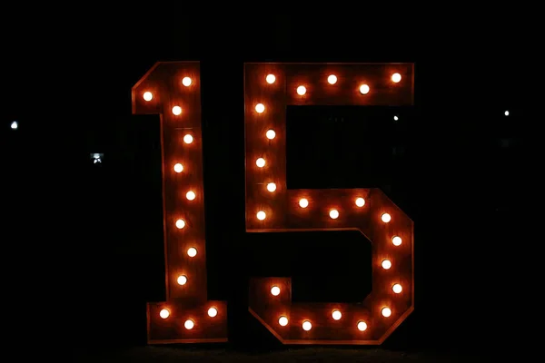 Number fifteen with lights on; fifteen illuminated; colorful num — Stock Photo, Image