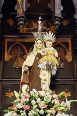 Statue of the image of Our Lady of Carmel - Nossa Senhora do Car clipart