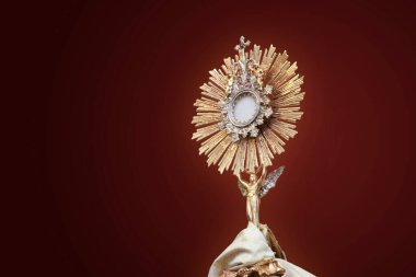 Ostensory for worship at a Catholic church ceremony - Adoration to the Blessed Sacrament - Catholic Church - Eucharistic Holy Hour - Holy Week clipart