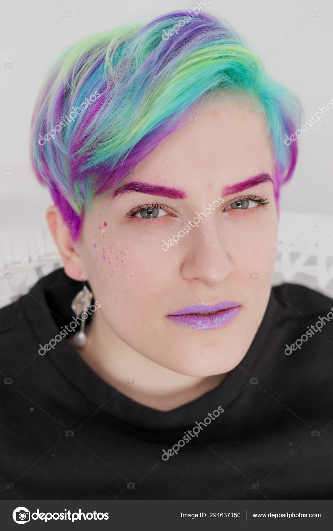 Young Beautiful Woman With Dyed Blue And Green Hair Pixie Bob