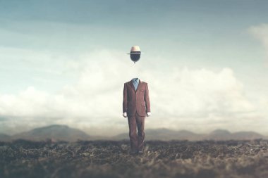 başının üzerinde askıya büyük siyah balon ile gerçeküstü minimalist adam