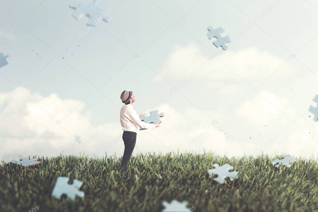 man observing pieces puzzle falling from the sky surreal concept