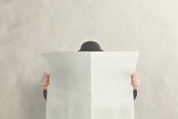 Man Bowler Holding Empty Newspaper — Stock Photo, Image