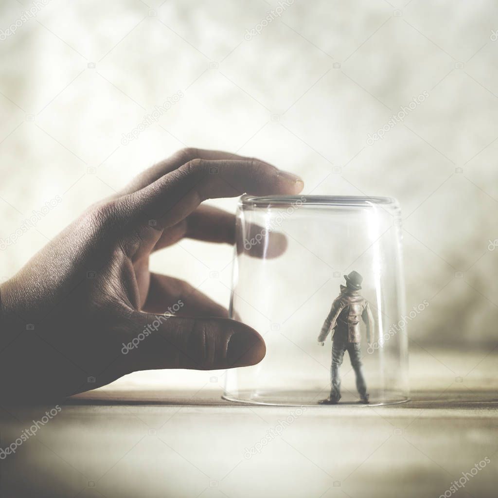 little man trapped in a glass, surreal concept