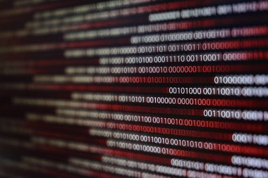 Kırmızı ikili kod. bilgisayar teknoloji arka plan. Kırmızı ikili kod bilgisayar dili veri aktarımı yapar. güvenli olmayan ve tehlikeli büyük veri ve AI yapay zeka siber ağ.