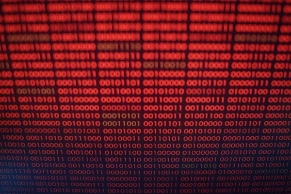 red binary code. computer technology background. red binary code computer language data transfers. unsecured and dangerous big data and ai artificial intelligence cyber network.